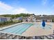 Enjoy the community pool featuring lap lanes, a splash pad, lounge chairs, and a charming clubhouse at 291 Preston Rd, Mooresville, NC 28117