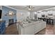 Open concept living room showing the fireplace and the kitchen at 291 Preston Rd, Mooresville, NC 28117