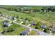 A quaint neighborhood features lush green lawns, mature trees and homes with well-maintained landscaping at 4808 Thoreau Dr, Conover, NC 28613
