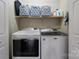 Convenient laundry area features modern, front-loading washer and dryer at 4808 Thoreau Dr, Conover, NC 28613