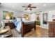 Spacious main bedroom features hardwood floors, a ceiling fan, and an ensuite bathroom at 4808 Thoreau Dr, Conover, NC 28613