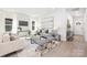 Open living space with modern decor, hardwood floors, and abundant natural light at 4827 Victoria Ave, Charlotte, NC 28269
