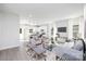 Spacious living room with an open floor plan, seamlessly connecting to the kitchen and dining area at 4827 Victoria Ave, Charlotte, NC 28269