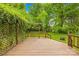 Beautiful back deck, perfect for enjoying the serene outdoor space and lush greenery at 509 Carole Ln, Charlotte, NC 28214