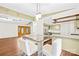Open concept dining area with direct sight lines to the kitchen and front entryway at 509 Carole Ln, Charlotte, NC 28214