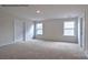 Spacious bedroom with carpet floors, lots of natural light from windows, and neutral paint at 580 N Sparkleberry St, Chester, SC 29706