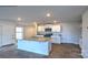 Modern kitchen features granite countertops, stainless steel appliances, and a spacious island at 580 N Sparkleberry St, Chester, SC 29706