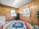 Multi-purpose room features wood paneling and a safe, perfect for a hobby or storage at 714 S 8Th St, Bessemer City, NC 28016