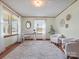 Bright living room with hardwood floors, neutral paint, decor, and natural light from large windows at 714 S 8Th St, Bessemer City, NC 28016