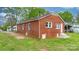 A neat brick house featuring a clean exterior and a well-kept lawn at 728 21St Sw St, Hickory, NC 28602
