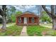 Charming brick home featuring a quaint front porch and a well-maintained yard at 728 21St Sw St, Hickory, NC 28602