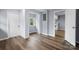 Inviting living room featuring new vinyl plank flooring and multiple entrances to other rooms at 728 21St Sw St, Hickory, NC 28602