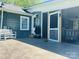 Relaxing back porch with bench seating and a welcoming entrance at 835 Leach Rd, Salisbury, NC 28146