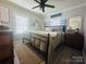 Inviting bedroom with a comfortable bed, hardwood floors, and ample natural light offering a relaxing atmosphere at 835 Leach Rd, Salisbury, NC 28146