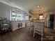Bright kitchen with stainless steel appliances, island seating, and ample cabinet storage at 835 Leach Rd, Salisbury, NC 28146
