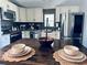 Well-equipped kitchen showcasing a central island, stainless steel appliances, and bright cabinetry for meal preparation at 835 Leach Rd, Salisbury, NC 28146
