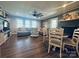 Inviting living room boasts hardwood floors and neutral décor, with an adjoining dining area at 835 Leach Rd, Salisbury, NC 28146