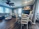 Comfortable living area features hardwood flooring, neutral tones, and dining space nearby at 835 Leach Rd, Salisbury, NC 28146