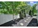 Backyard featuring an outdoor seating area, landscaping, mature trees, and privacy fence at 861 Watling St, Fort Mill, SC 29715