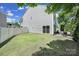 Fenced backyard with a sliding glass door leading to a patio at 861 Watling St, Fort Mill, SC 29715