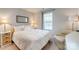 Comfortable bedroom with a window, bedside tables, lamps, and an accent chair at 861 Watling St, Fort Mill, SC 29715