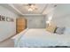 Cozy bedroom with tray ceiling, ceiling fan, closet, and carpeted floor provides a relaxing space at 861 Watling St, Fort Mill, SC 29715