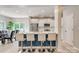 Kitchen featuring quartz countertop island with barstool seating and stainless steel appliances at 861 Watling St, Fort Mill, SC 29715