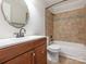 Cozy bathroom featuring a vanity, and a tiled shower-over-tub combo at 8718 Rittenhouse Cir, Charlotte, NC 28270