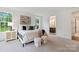 Comfortable bedroom with a view to an ensuite bathroom through the open door at 8756 Sherrills Ford Rd, Sherrills Ford, NC 28673
