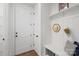Welcoming entryway with built-in bench and storage, providing a functional and stylish space at 8756 Sherrills Ford Rd, Sherrills Ford, NC 28673