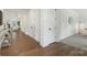 Hallway showcasing beautiful hardwood floors and white doors at 8756 Sherrills Ford Rd, Sherrills Ford, NC 28673