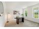 Bright home office with natural light, neutral decor, and minimalist furnishings at 8756 Sherrills Ford Rd, Sherrills Ford, NC 28673