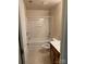 Clean bathroom featuring a shower-tub combo and a vanity sink at 9668 Walkers Glen Nw Dr, Concord, NC 28027