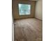 Spacious bedroom with large window and neutral carpet at 9668 Walkers Glen Nw Dr, Concord, NC 28027