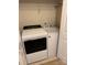 Convenient laundry room with modern washer and dryer at 9668 Walkers Glen Nw Dr, Concord, NC 28027