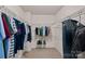 Walk-in closet with carpet and wire shelving at 9867 Travertine Trl, Davidson, NC 28036