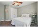 Cozy bedroom featuring neutral walls, a comfortable bed, and a ceiling fan at 10056 Paisley Dr, Charlotte, NC 28269