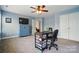 Bedroom featuring a desk, closet, and blue dresser at 10056 Paisley Dr, Charlotte, NC 28269