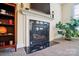 Close-up of a modern fireplace with black marble and a white mantle at 10056 Paisley Dr, Charlotte, NC 28269