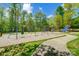Community playground with swings, slides, and a soft ground covering for safety and fun activities at 10056 Paisley Dr, Charlotte, NC 28269