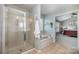 Bright bathroom with large tub, walk-in shower, and neutral tile flooring at 10354 Scotland Ave, Fort Mill, SC 29707