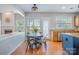 Eat-in dining area next to kitchen with fireplace and view to outside at 10354 Scotland Ave, Fort Mill, SC 29707