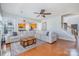 Cozy living room features a hardwood floor, lots of space, and an open view to the entrance and kitchen at 10354 Scotland Ave, Fort Mill, SC 29707
