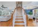 Inviting foyer featuring a staircase with wood treads and white risers leading to the upper level at 10354 Scotland Ave, Fort Mill, SC 29707
