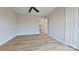 Bright bedroom boasts wood floors and natural light at 10526 Hill Point Ct, Charlotte, NC 28262