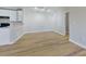 Open-concept living area with hardwood floors and natural light; a perfect space for relaxation and entertaining at 10526 Hill Point Ct, Charlotte, NC 28262