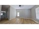 Spacious main bedroom boasts wood floors and ensuite bathroom at 10526 Hill Point Ct, Charlotte, NC 28262
