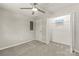 Bedroom features neutral walls, carpet flooring, a ceiling fan and closet space at 109 W Poplar St, Stanley, NC 28164