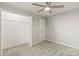 Bedroom features neutral walls, carpet flooring, a ceiling fan and closet space at 109 W Poplar St, Stanley, NC 28164