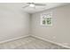 Bedroom featuring neutral walls, carpet flooring, and a ceiling fan at 109 W Poplar St, Stanley, NC 28164